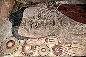 Bagan Myanmar. Sulamani temple. Large painted reclining Buddha. 